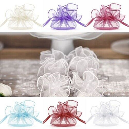 20 Geschenkbeutel Organza | Ø 6 cm - rund, in verschiedenen Farben auf einem Tisch arrangiert, ideal für kleine Geschenke und Events.