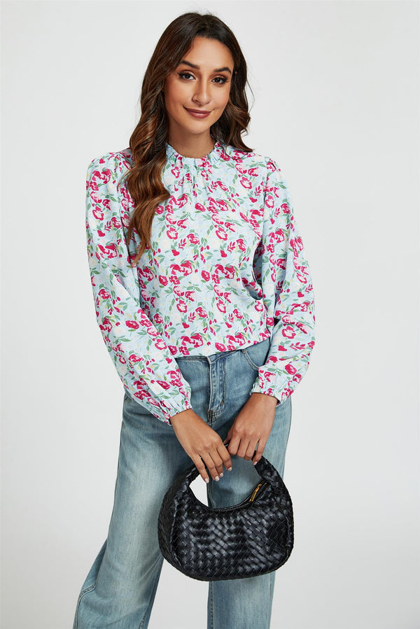 Stehkragen-Top mit Blumendruck und Rueschendetail in Blau und Pink
