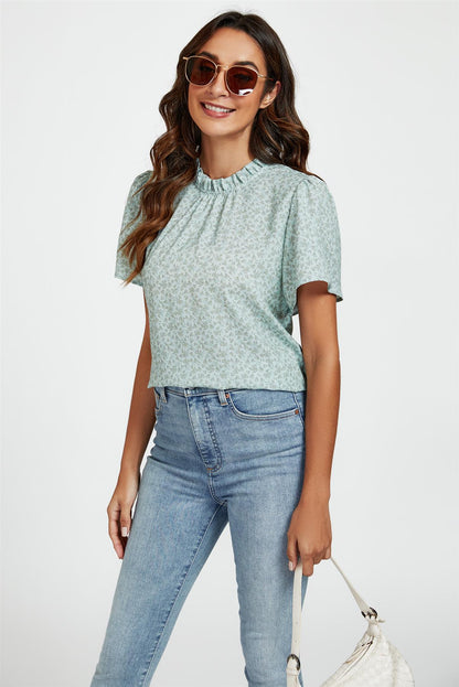 Stehkragen-Bluse mit grauem Blumendruck & Engelärmeln in Blau